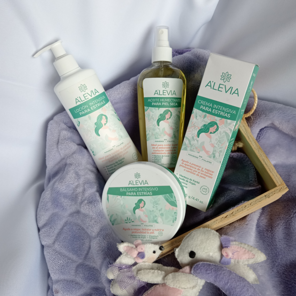 Crema para las estrías, aceite para las estrías y loción para las estrías